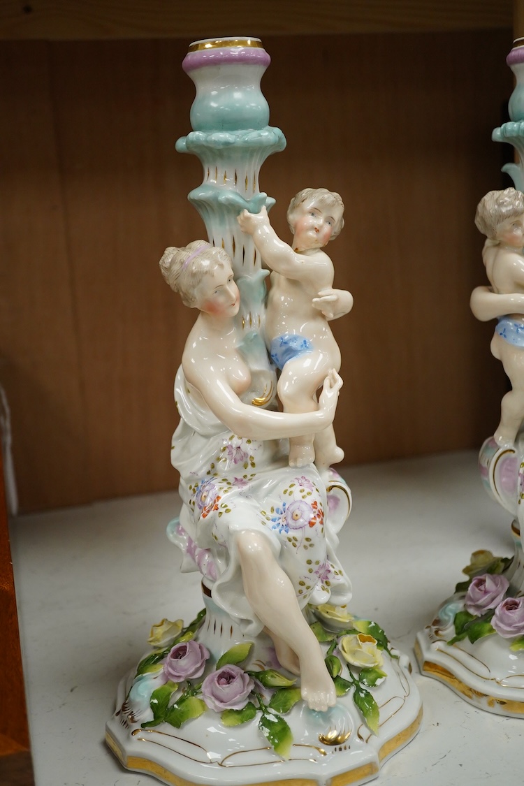 A pair of Jacob Petit porcelain figural candlesticks, 34cm